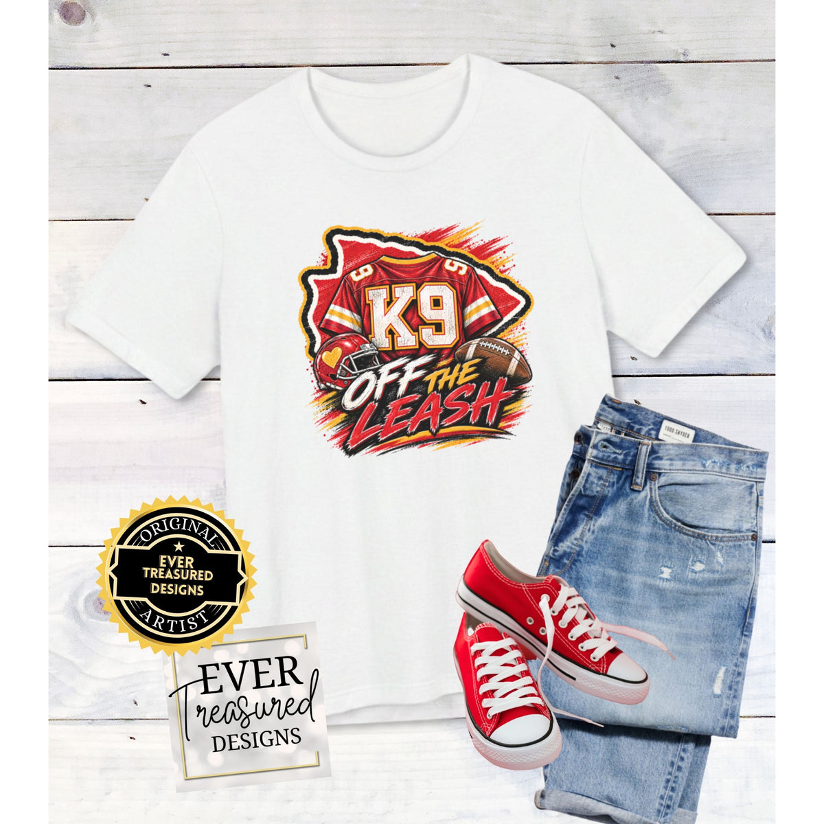 White t-shirt with "K9 Off The Leash" graphic, jeans, and red sneakers.