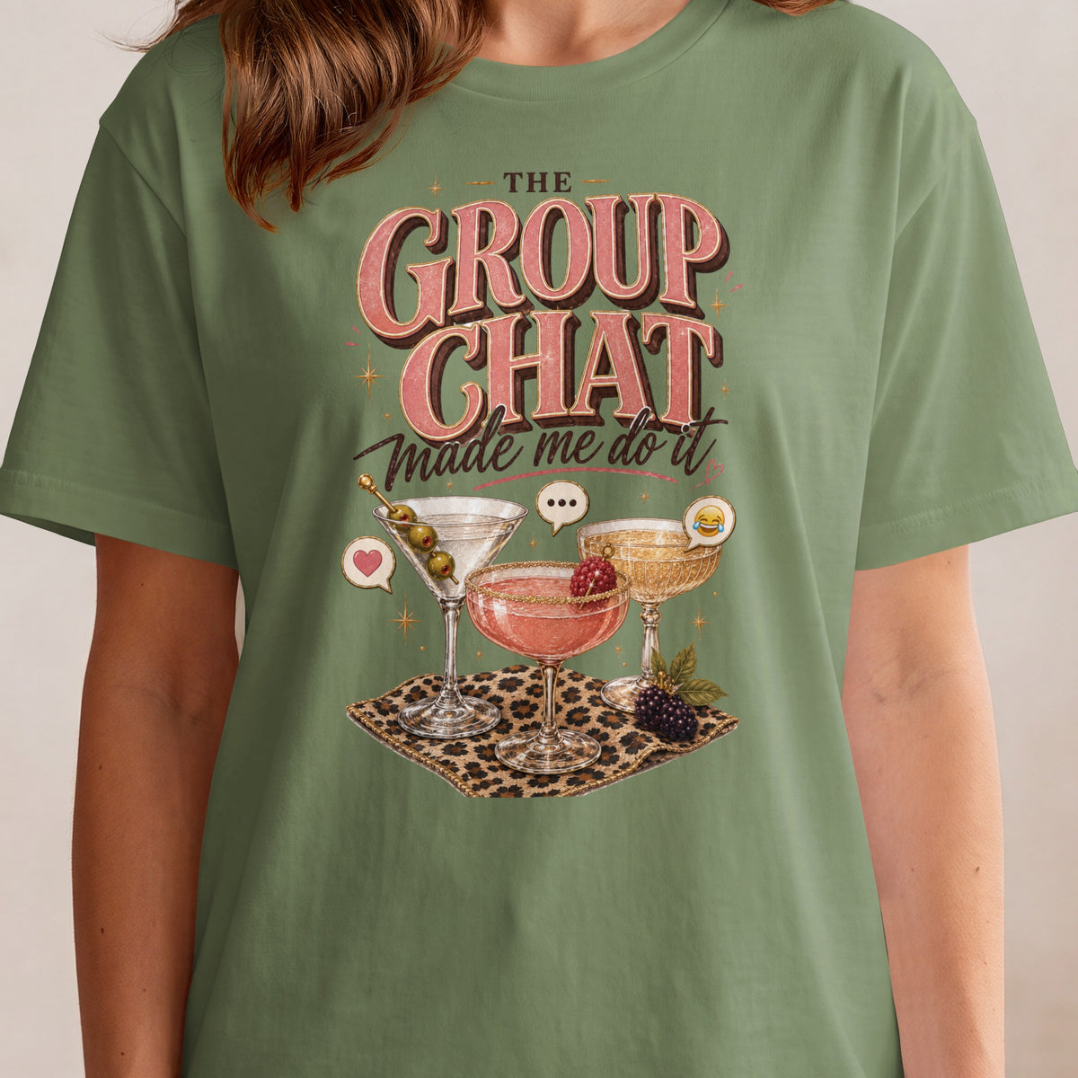 Green t-shirt with "The Group Chat Made Me Do It" text and cocktail illustrations.