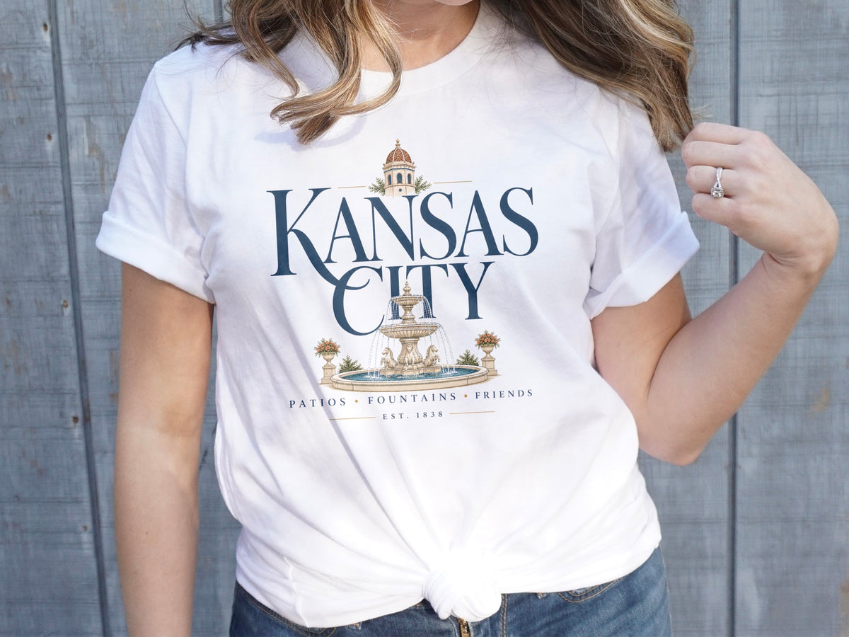White t-shirt with "Kansas City" and fountain design.