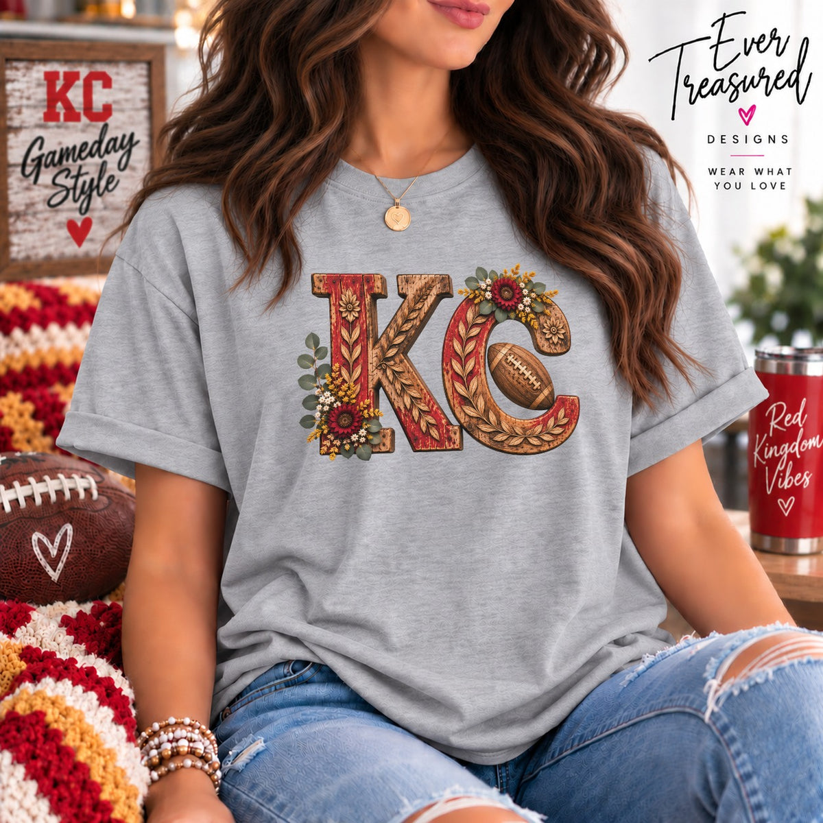 Grey t-shirt with vintage floral "KC" design and football, styled with jeans.