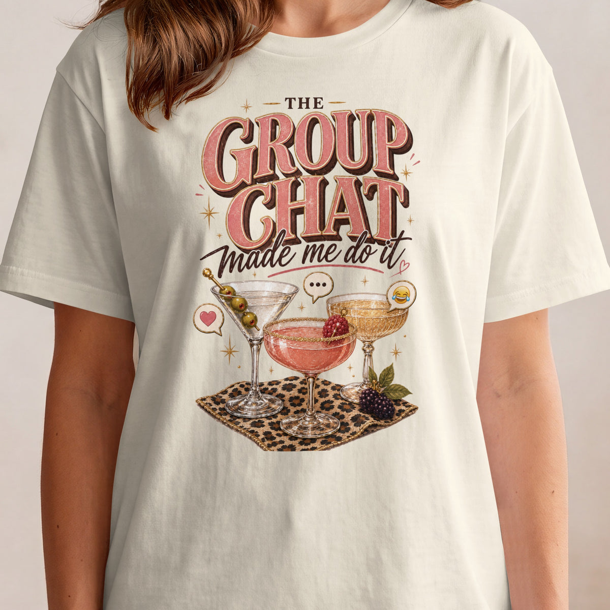 "The Group Chat Made Me Do It" text with cocktails on leopard print.