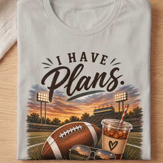 Football, drink, and sunglasses at a stadium at sunset with text "I HAVE Plans".