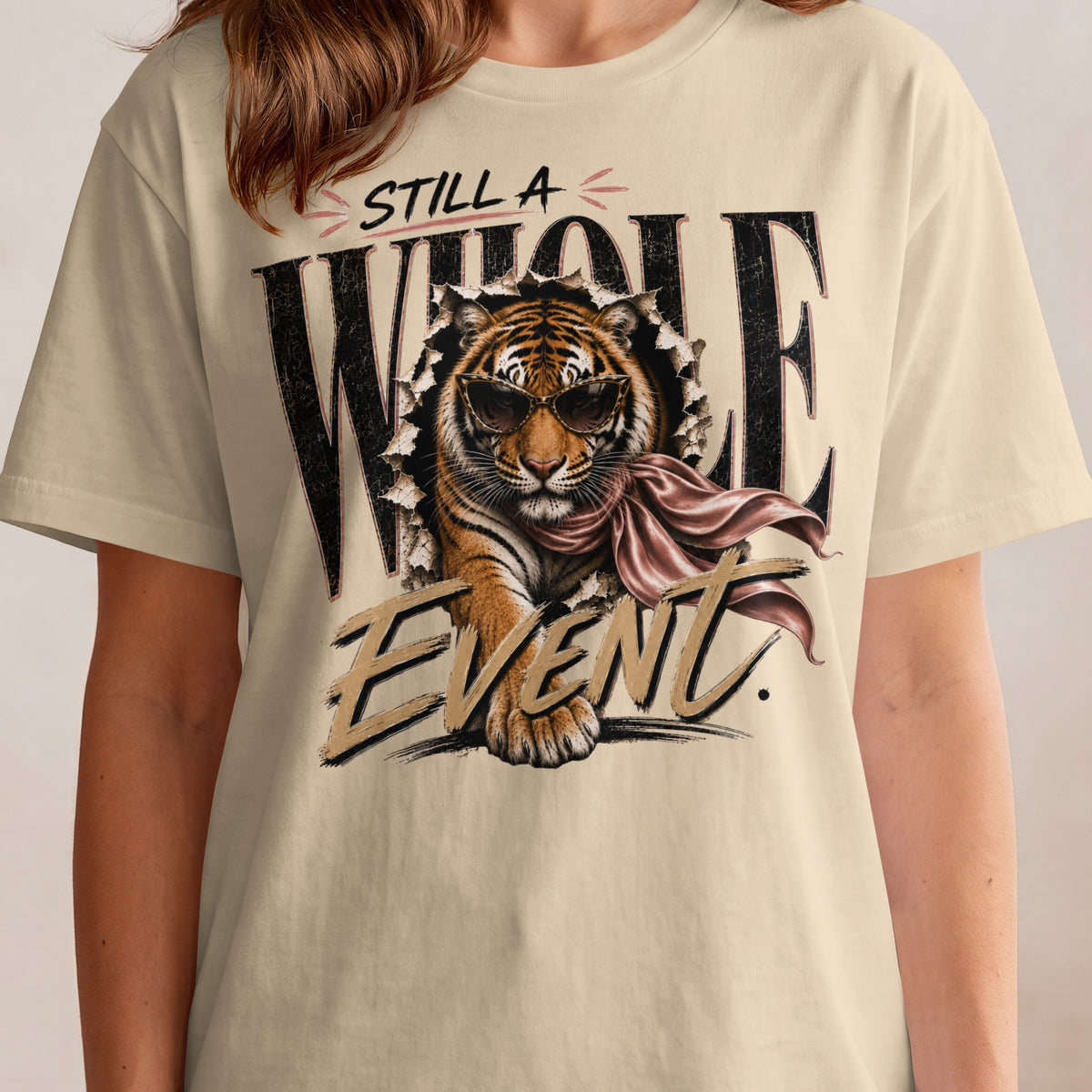 Tiger wearing sunglasses and scarf bursts through text saying "STILL A WHOLE EVENT".