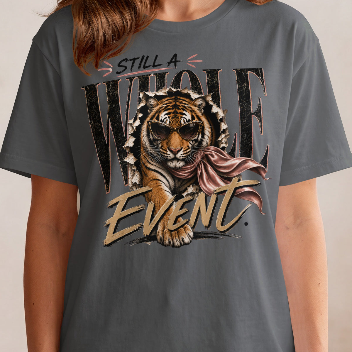 Tiger wearing sunglasses bursts through torn fabric, with text "STILL A WHOLE EVENT."