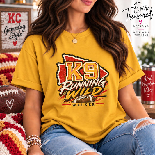 Yellow t-shirt with K9 Running Wild graphic and football.
