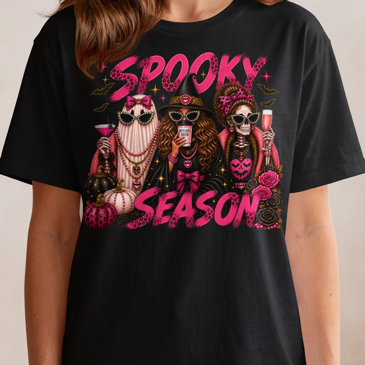 "Spooky Season" text with Halloween figures: ghost, witch, skeleton, pumpkins, and bats.