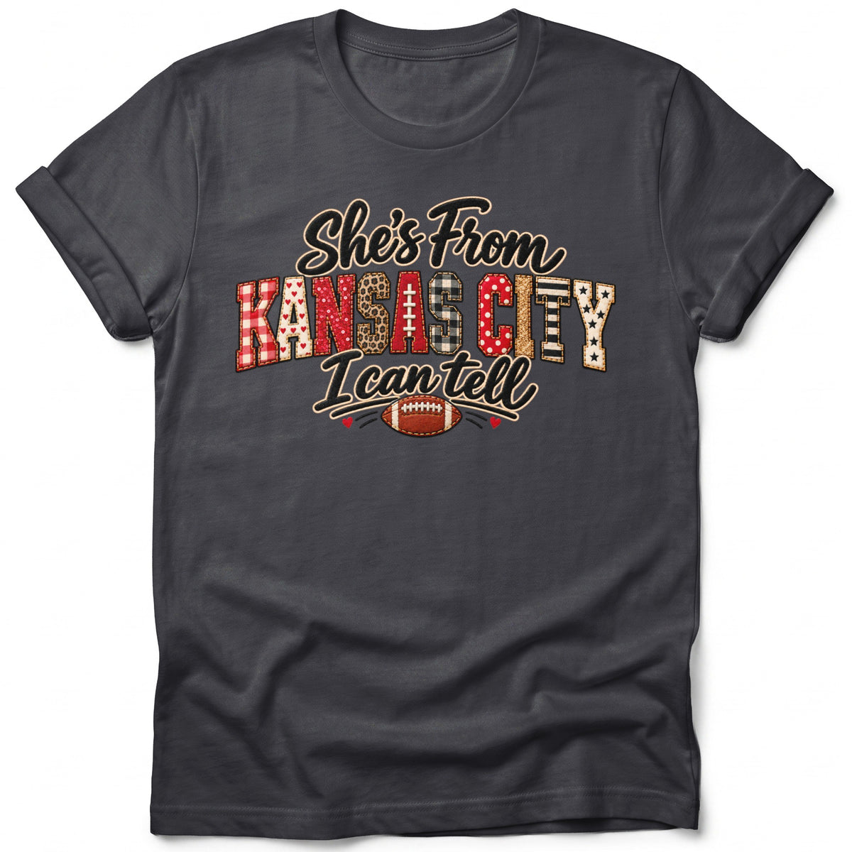 Gray t-shirt with text "She's From KANSAS CITY I can tell" and football graphic.