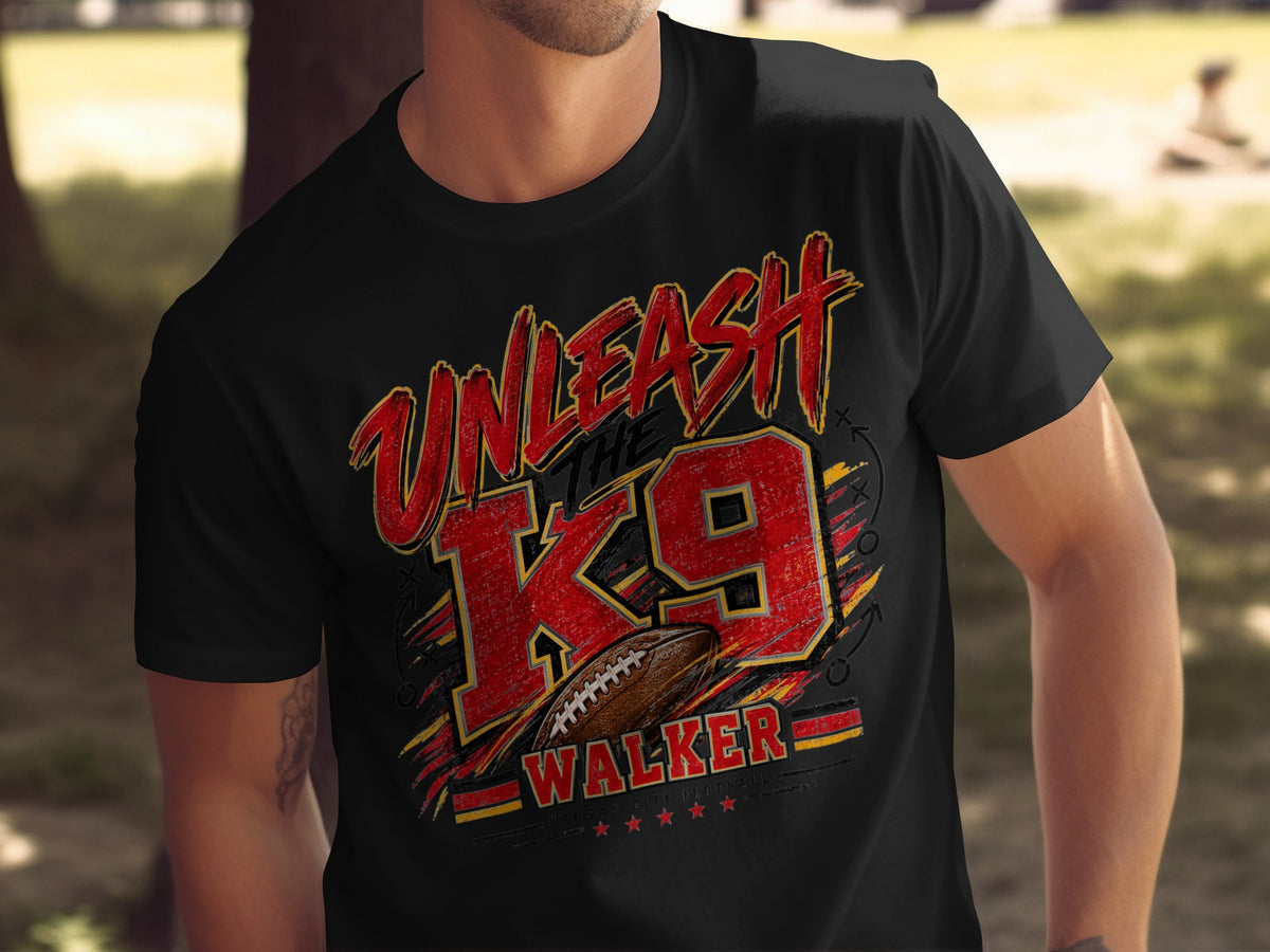 Black t-shirt with red and yellow "Unleash The K9 Walker Kansas City Football" graphic and football.