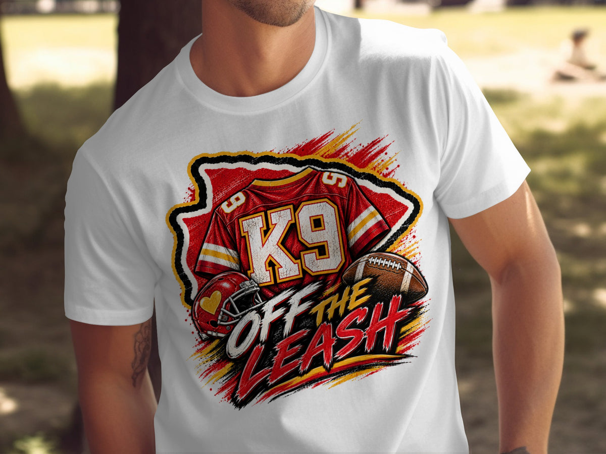 White t-shirt with K9 jersey graphic, football, helmet, and text "OFF THE LEASH".