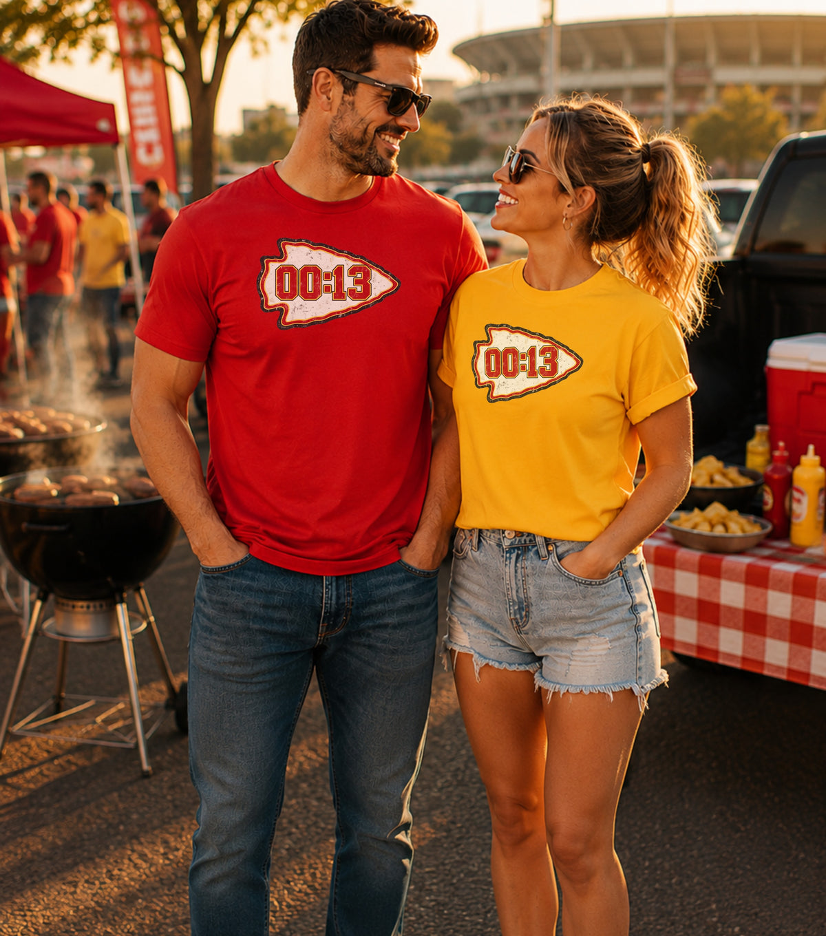 Couple wearing matching red and yellow shirts with "00:13" logo.