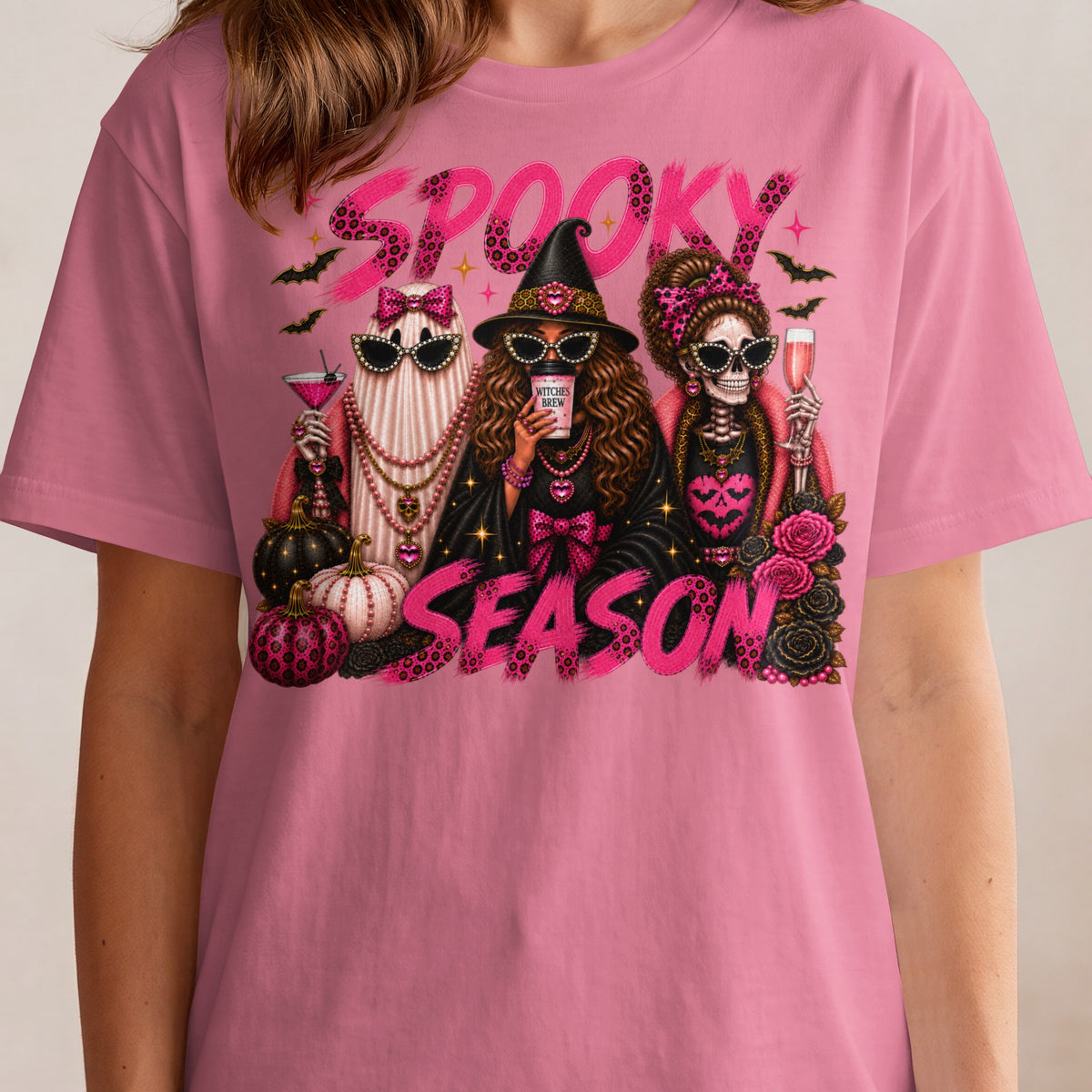 "Spooky Season" text with a ghost, witch, and skeleton holding drinks and pumpkins.