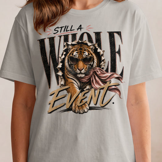 Tiger wearing sunglasses and scarf bursts through ripped paper with text.