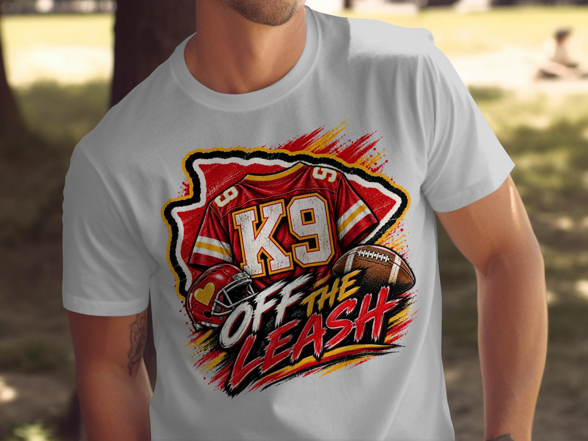 Gray t-shirt with graphic of K9 jersey, football, and helmet with text Off The Leash.