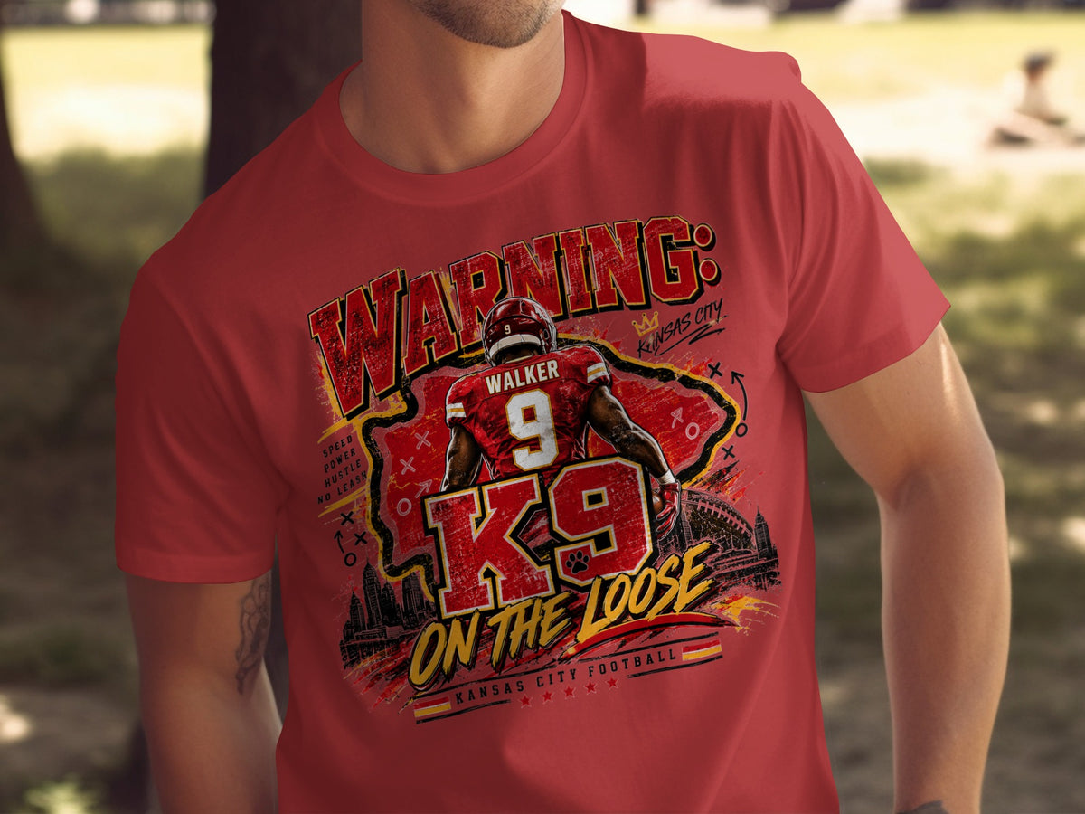 Kansas City football shirt with "WARNING: K9 ON THE LOOSE" text and player illustration.