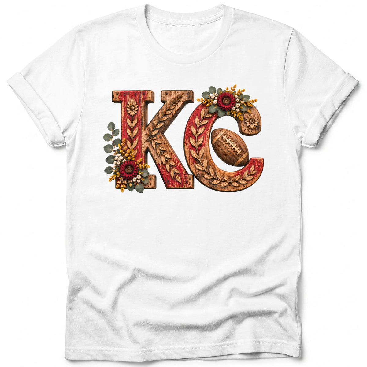 White t-shirt with large "KC" graphic featuring wood texture, flowers, and football.