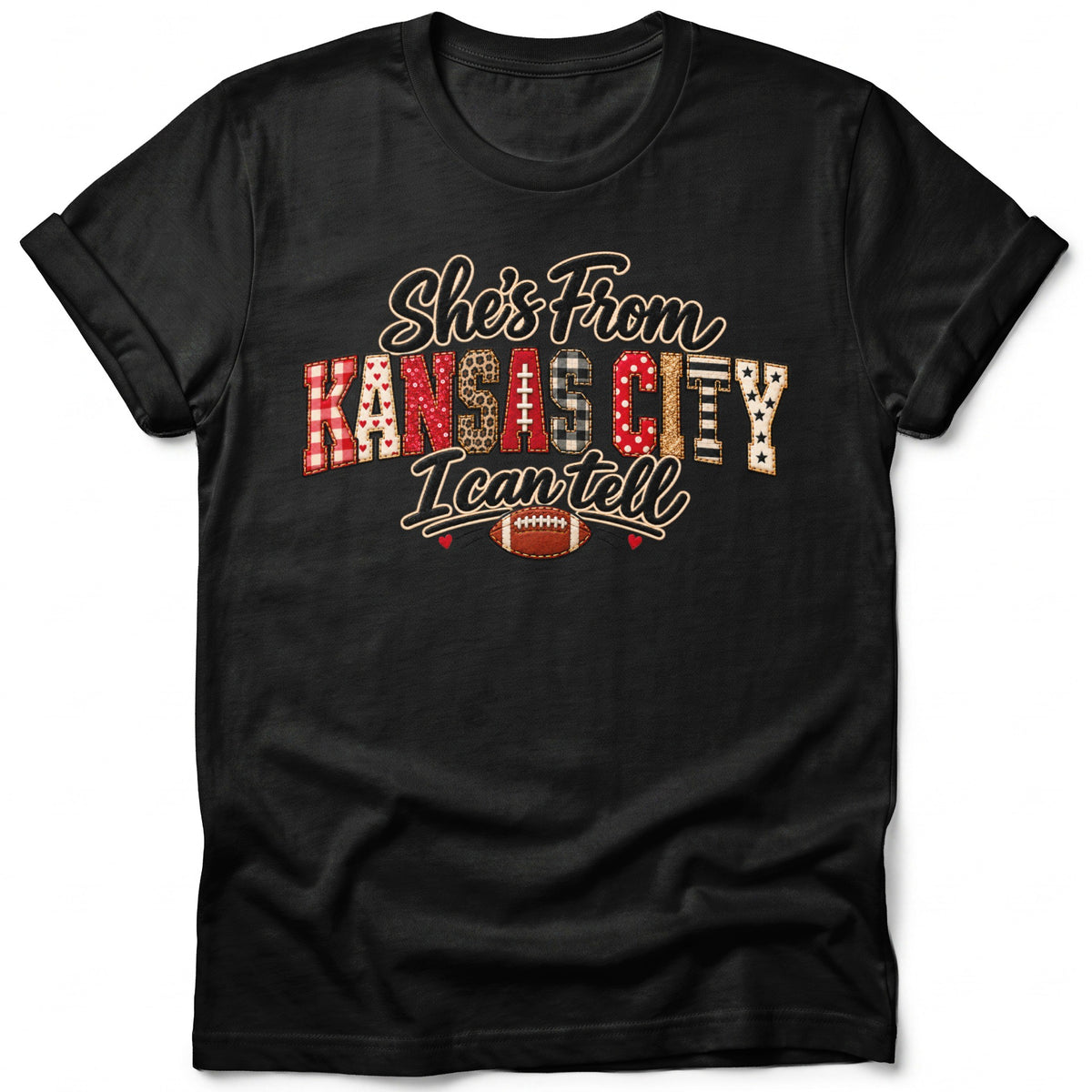 Black t-shirt with "She's From Kansas City I Can Tell" and football graphic.