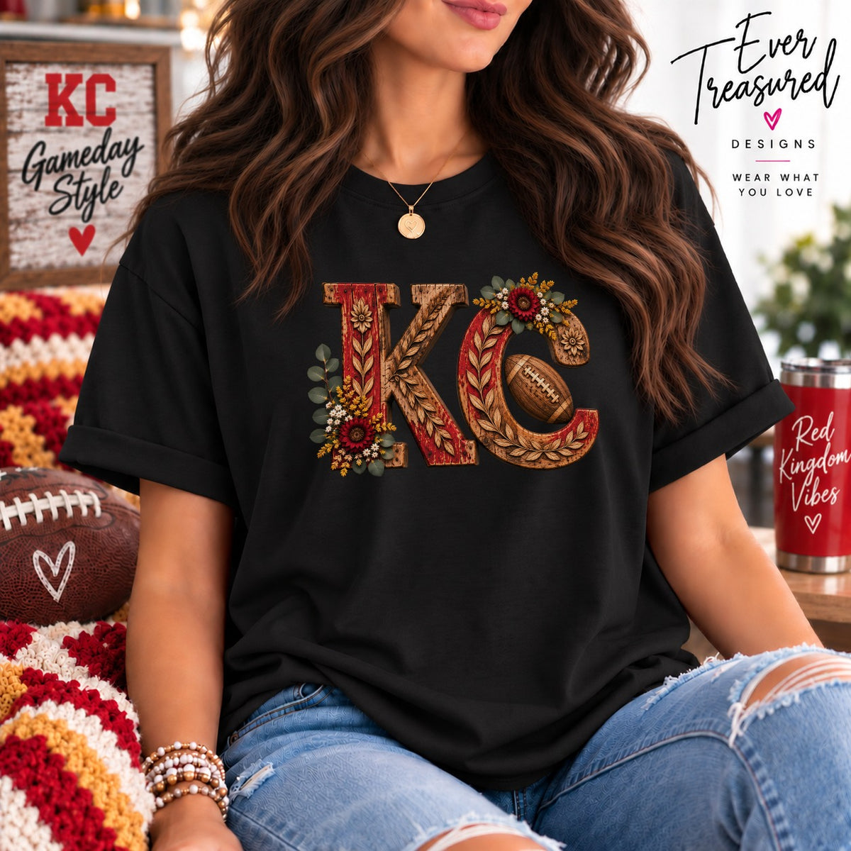 Black t-shirt with distressed "KC" graphic featuring floral accents and a football.