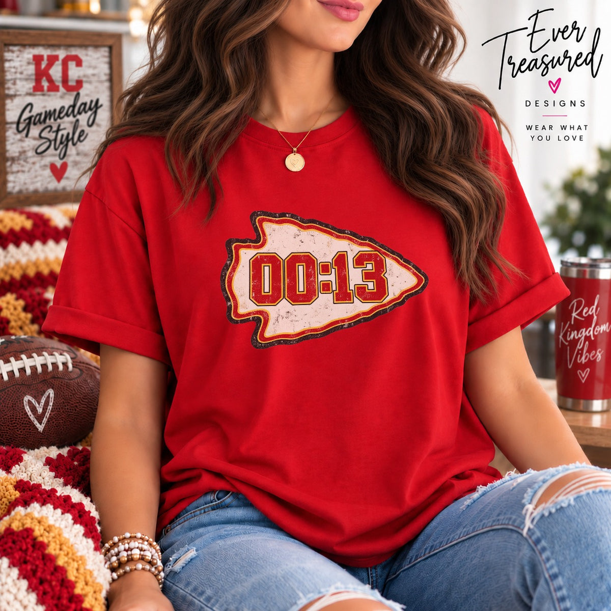 Red t-shirt with "00:13" in a distressed arrowhead graphic.