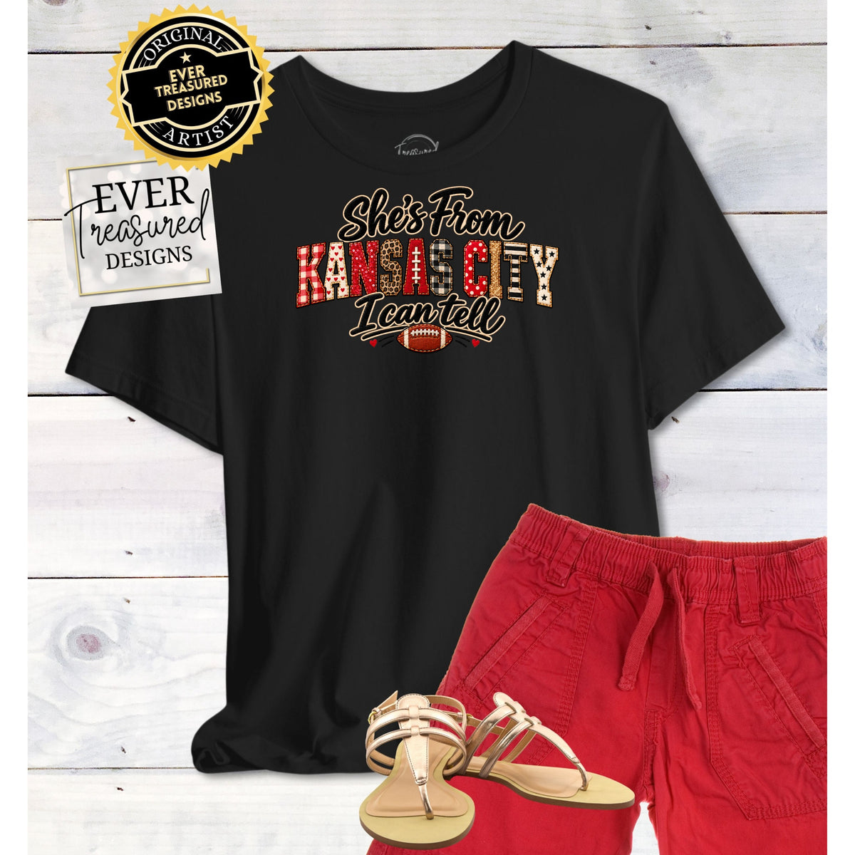 Black t-shirt with "She's From Kansas City I can tell" text and football graphic.