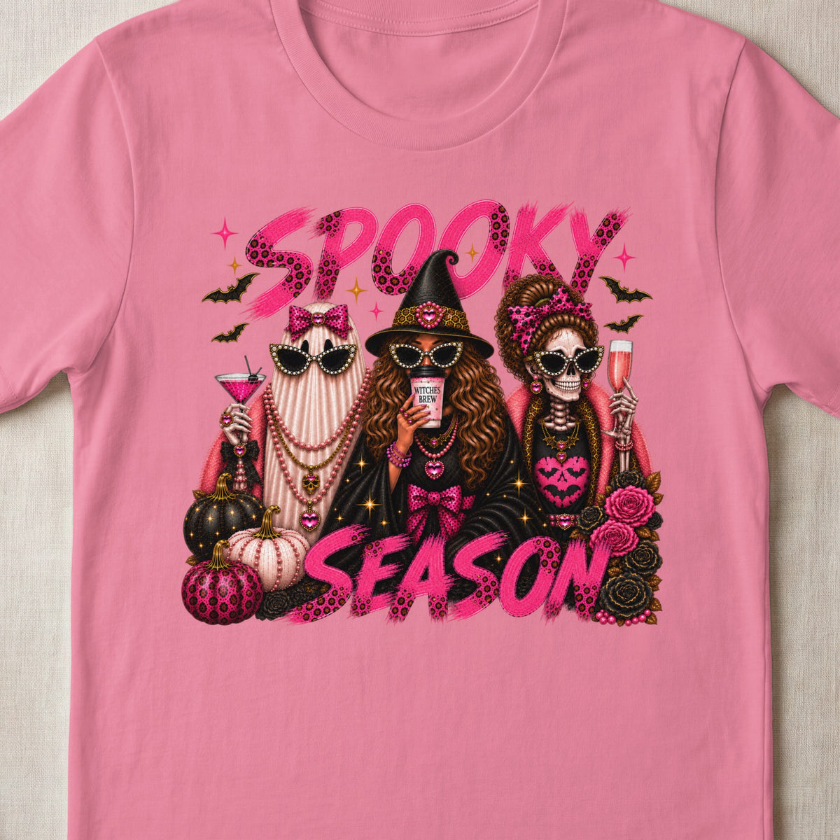 Spooky Season text with a ghost, witch, and skeleton, surrounded by pumpkins and roses.