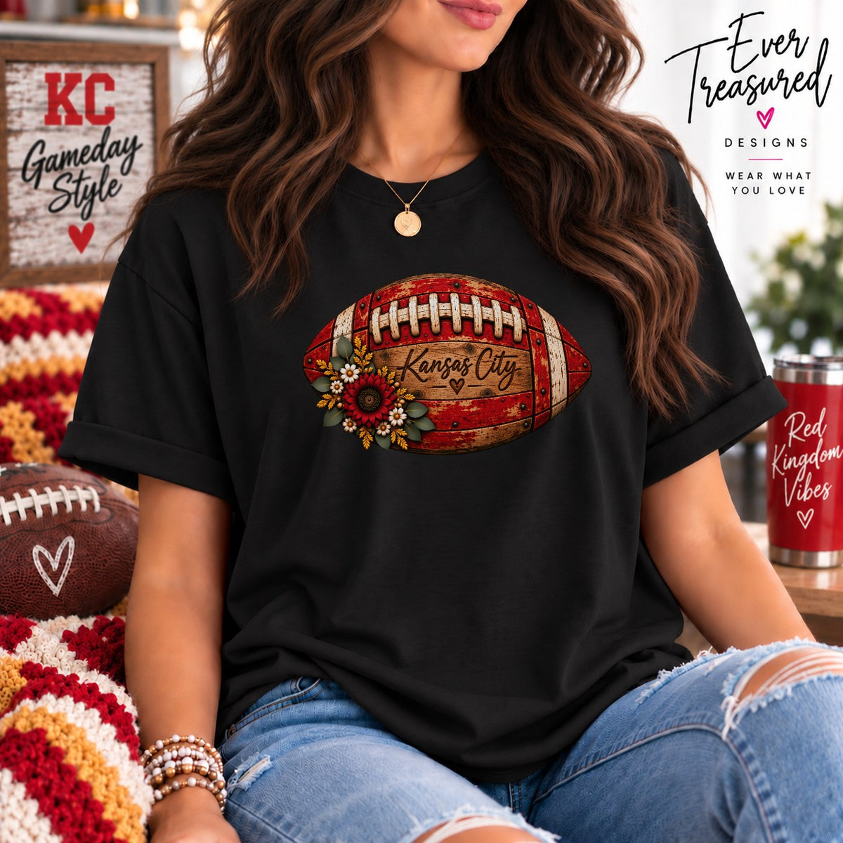 Black t-shirt with a football graphic featuring "Kansas City" and floral accents.
