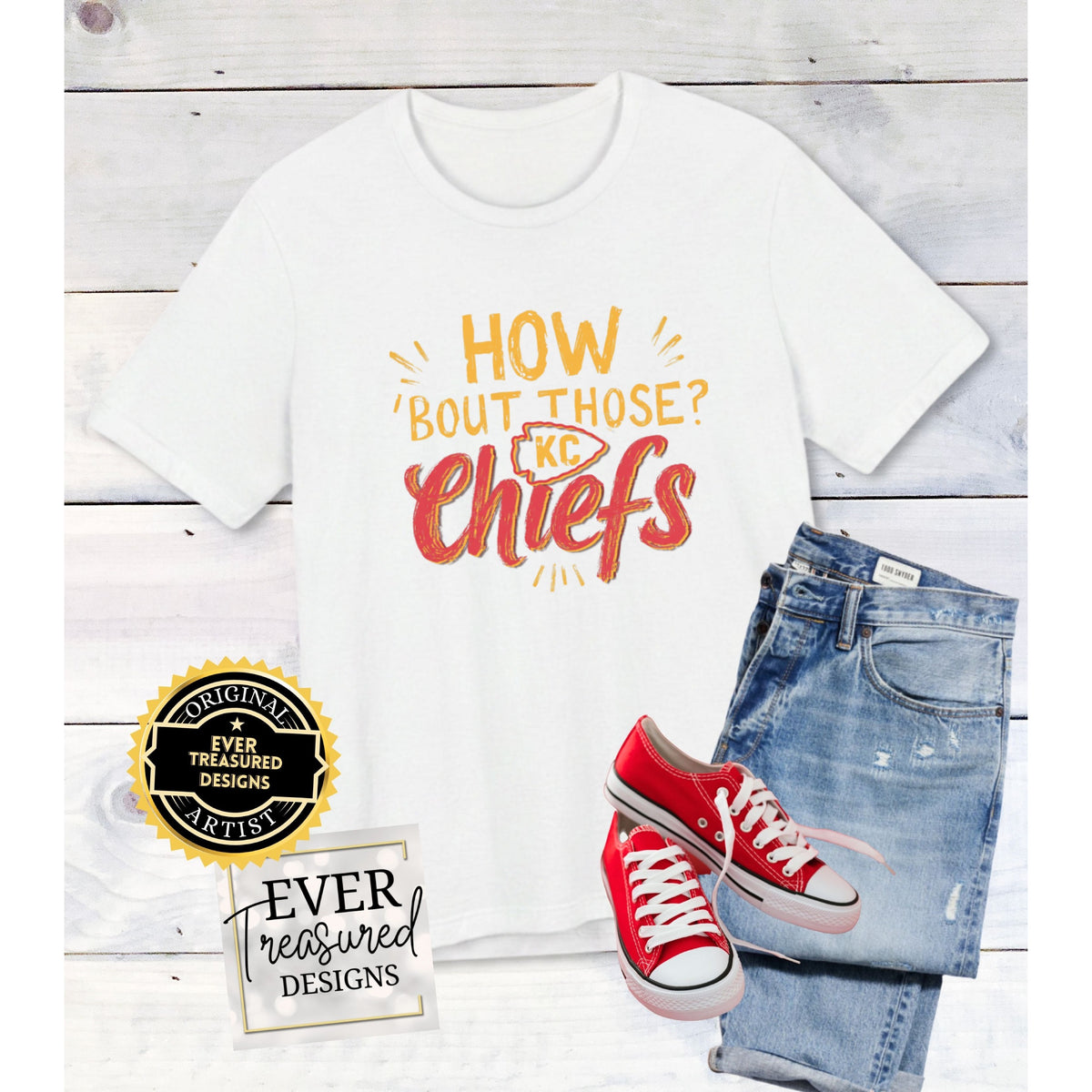 White t-shirt with "How 'Bout Those Chiefs?" graphic and red sneakers.
