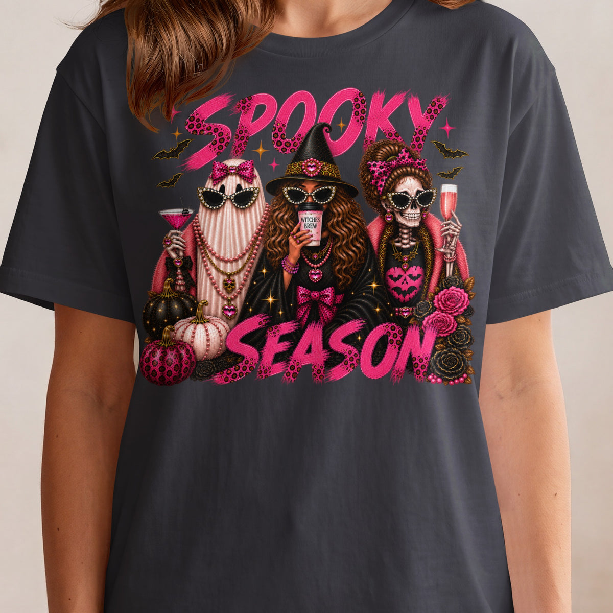 Three stylized Halloween characters, ghost, witch, and skeleton, with "SPOOKY SEASON" text.