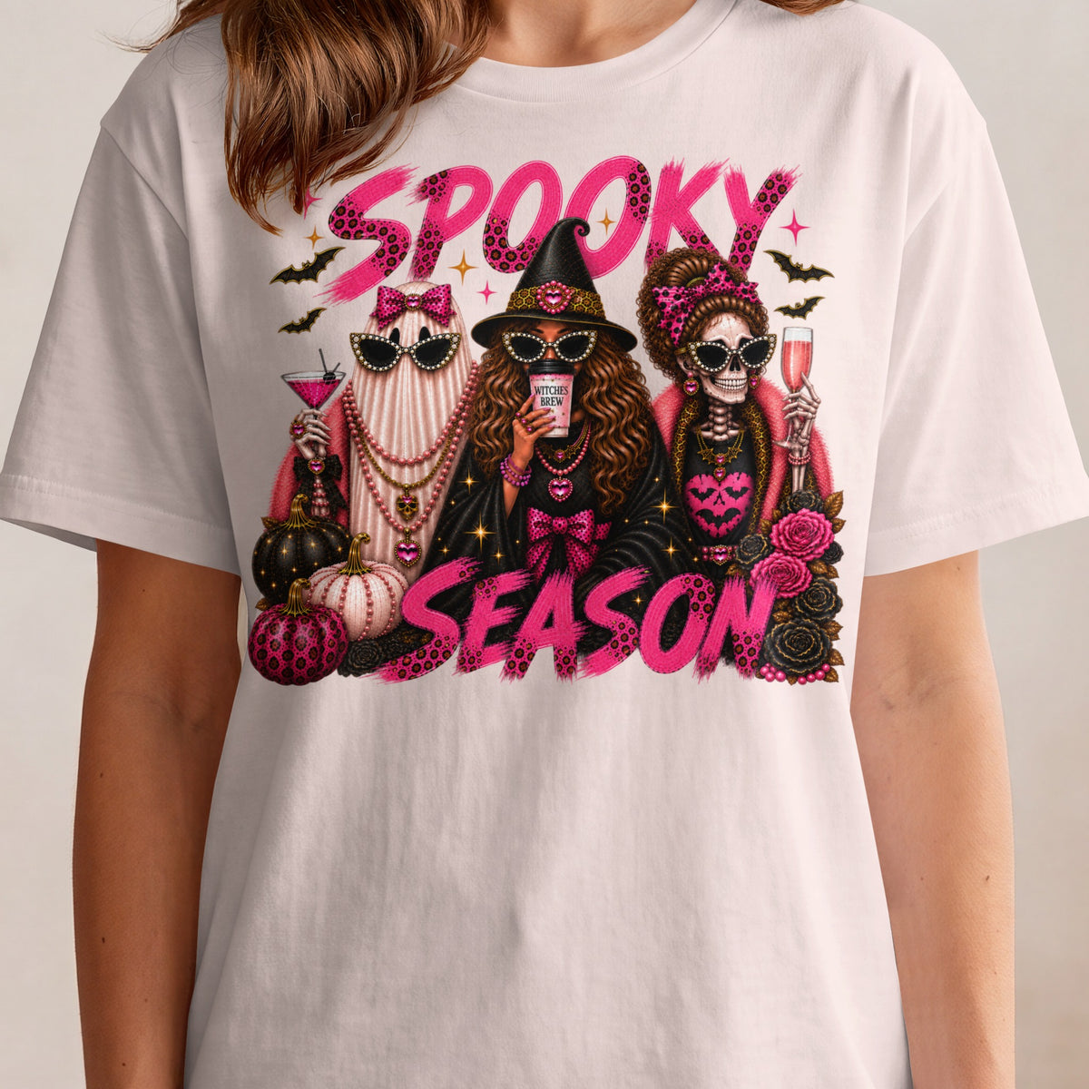 "Spooky Season" text with a ghost, witch, and skeleton wearing sunglasses, holding drinks.