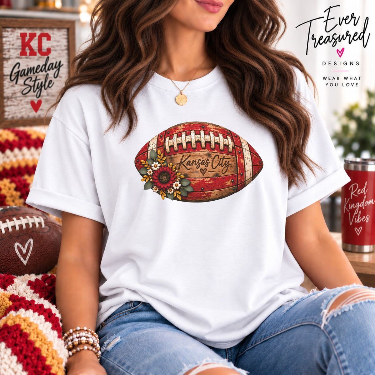 White t-shirt with a distressed football graphic featuring "Kansas City" text and flowers.