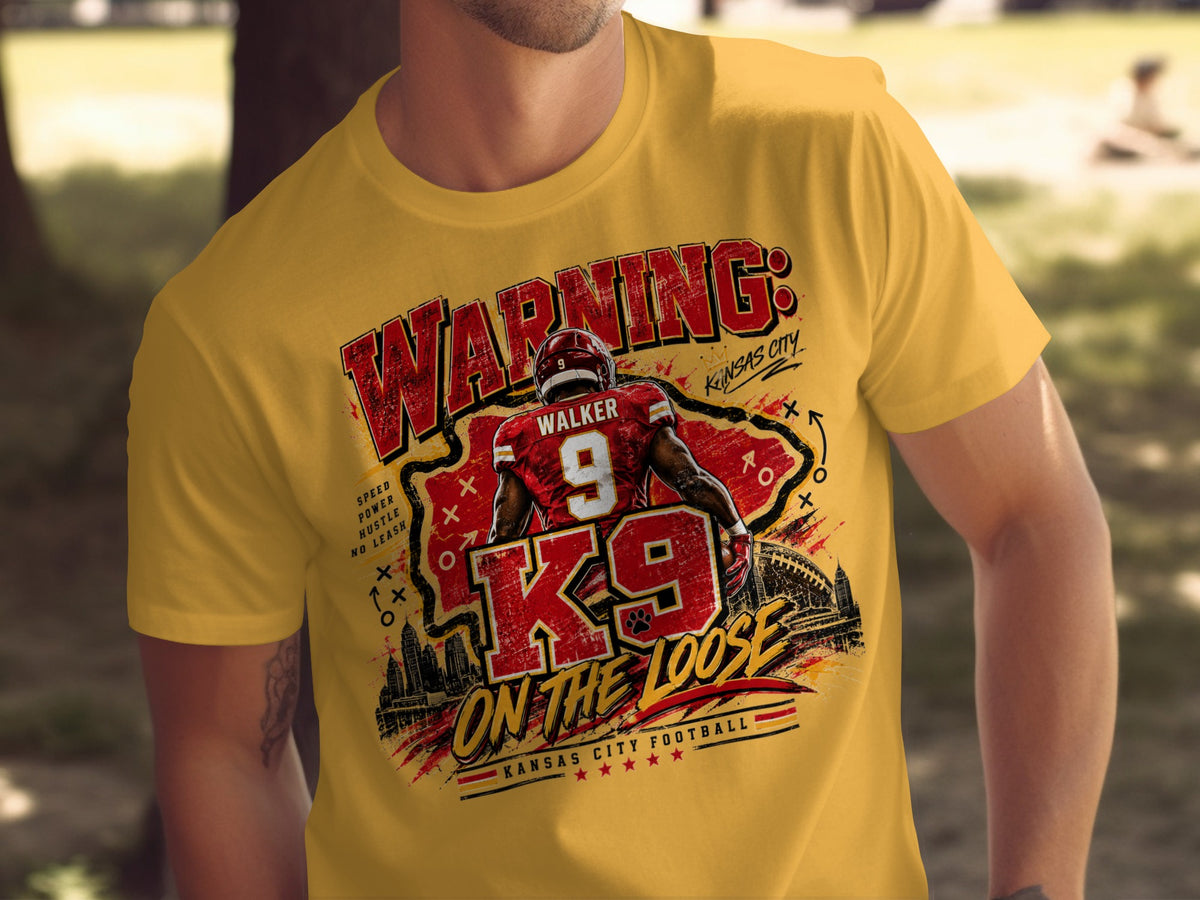 Yellow t-shirt with "Warning K9 On The Loose" and Kansas City football graphic.