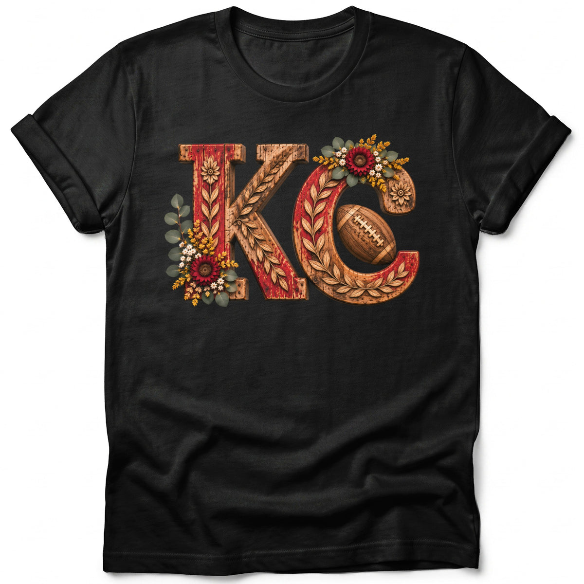 Black t-shirt with large wooden letters "KC" featuring floral accents and a football.