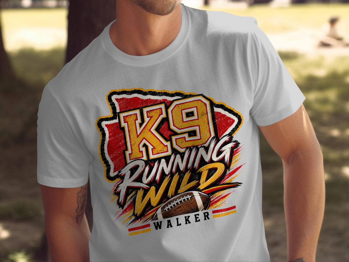 Grey t-shirt with "K9 Running Wild" text and a football graphic.