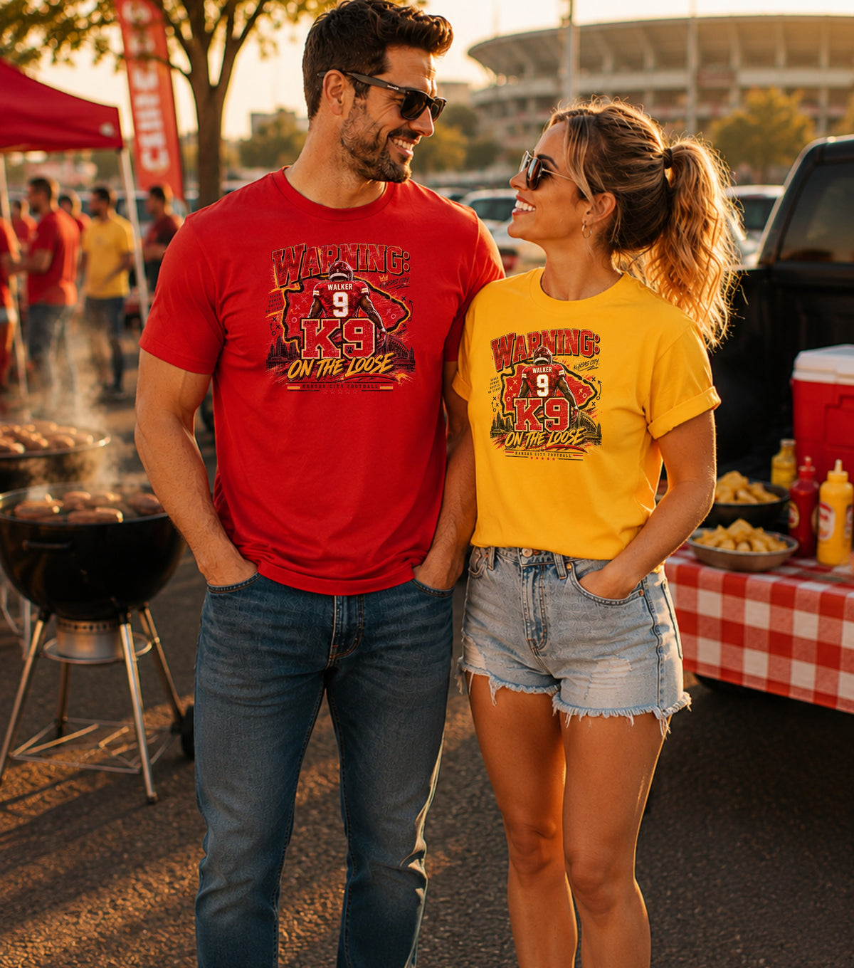 Man and woman wearing matching shirts with "WARNING: K9 ON THE LOOSE" graphic.