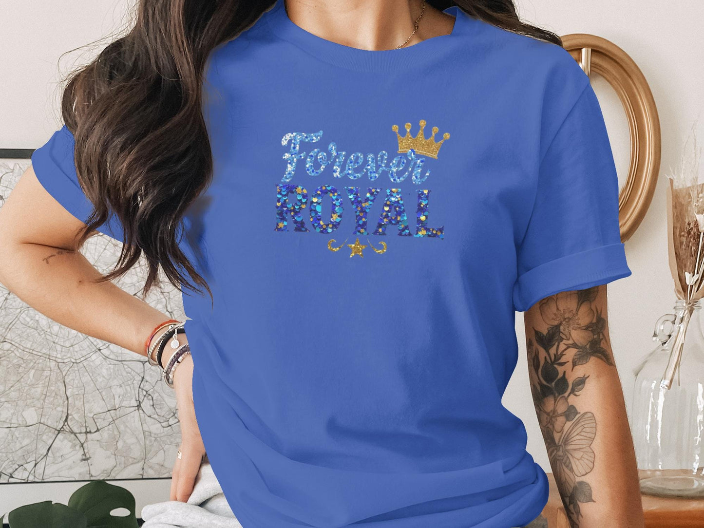 Blue t-shirt with "Forever Royal" text and a golden crown.