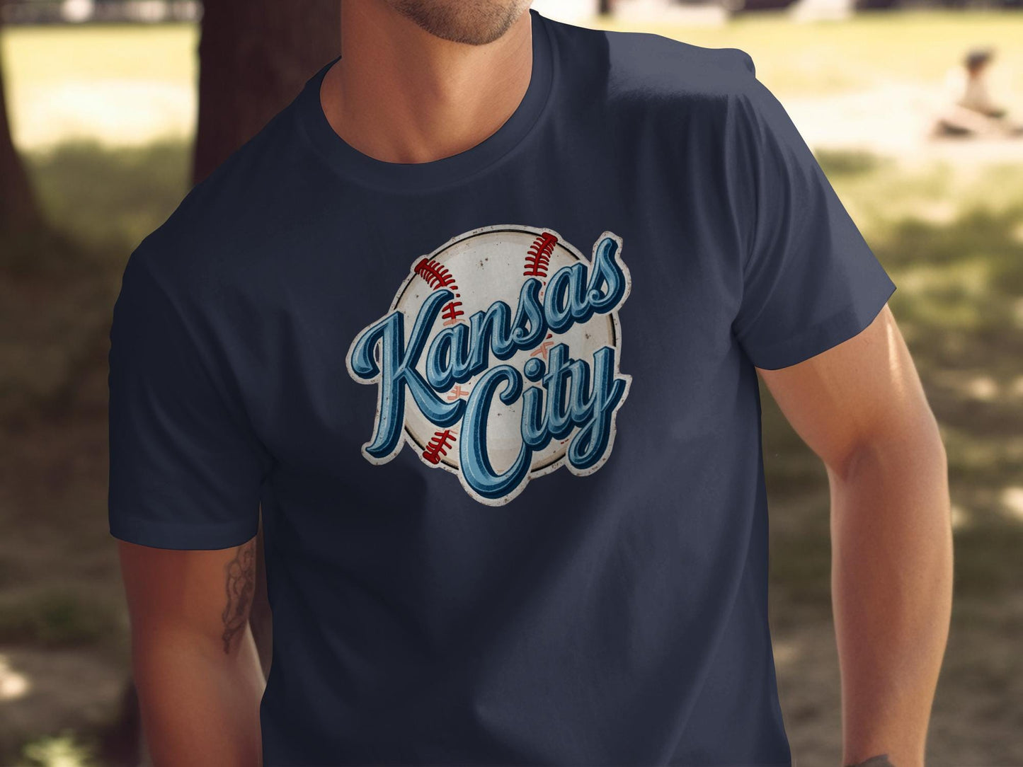 Navy t-shirt with "Kansas City" baseball graphic.
