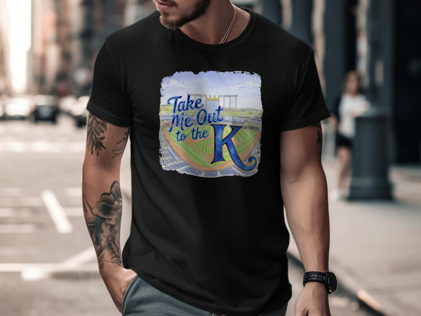 Black t-shirt with "Take Me Out to the K" text and baseball stadium graphic.