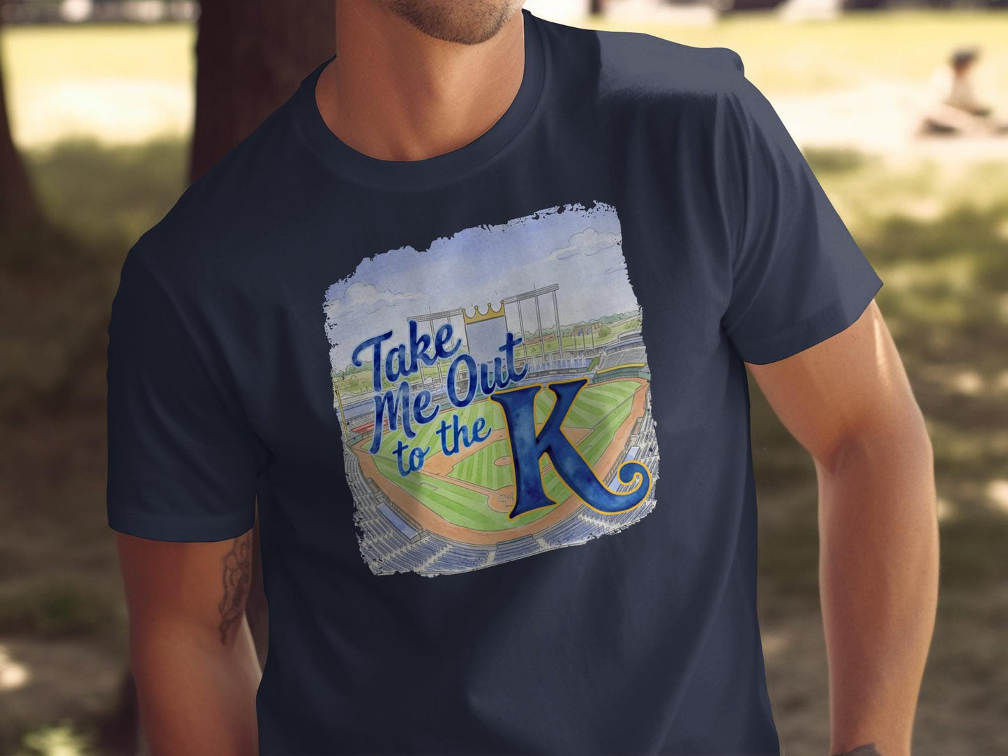 Navy t-shirt with "Take Me to the K" and stadium graphic.