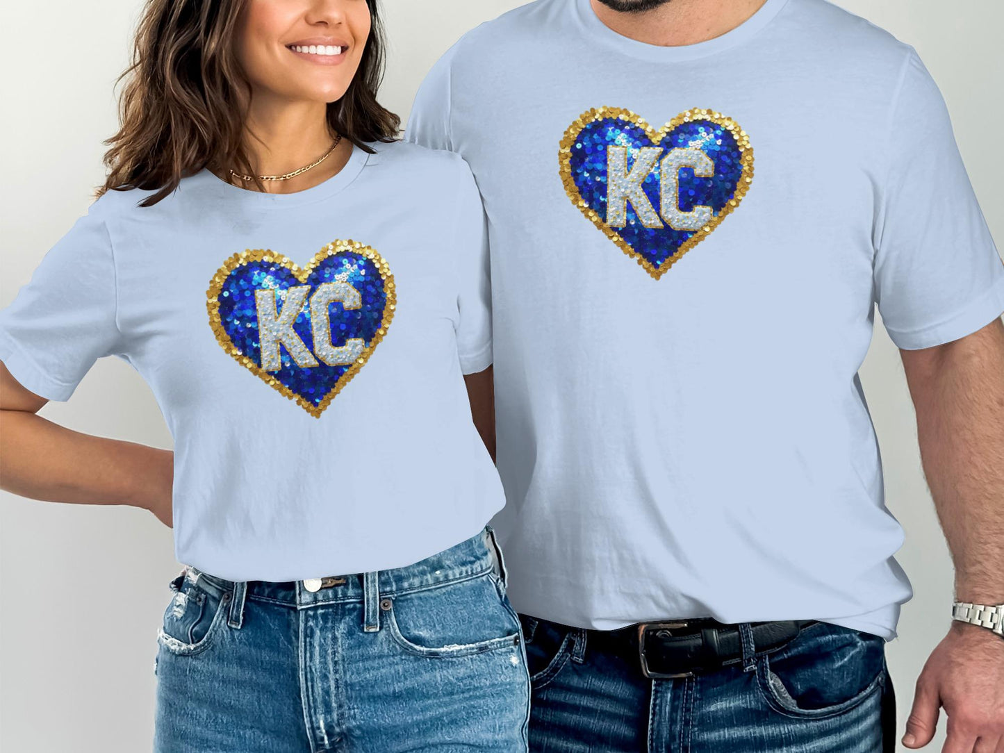 Light blue t-shirts featuring a gold sequin heart with "KC" inside.