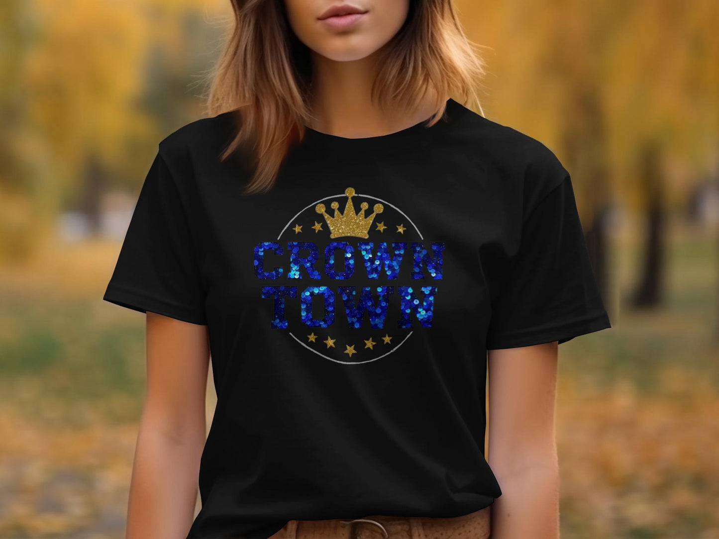Black t-shirt with sequined blue crown and "Crown Town" text.