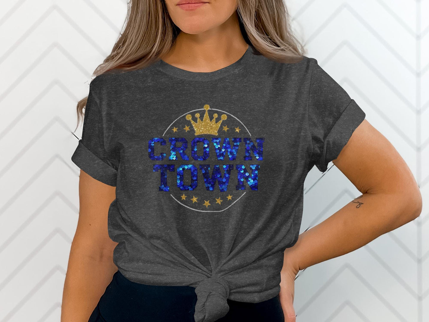 Dark gray t-shirt with "Crown Town" text and crown graphic.
