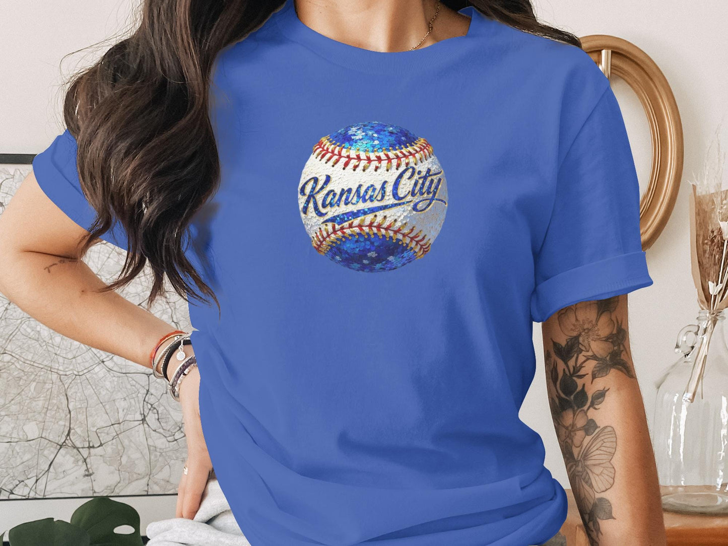 Blue t-shirt with a sequined baseball graphic featuring "Kansas City".