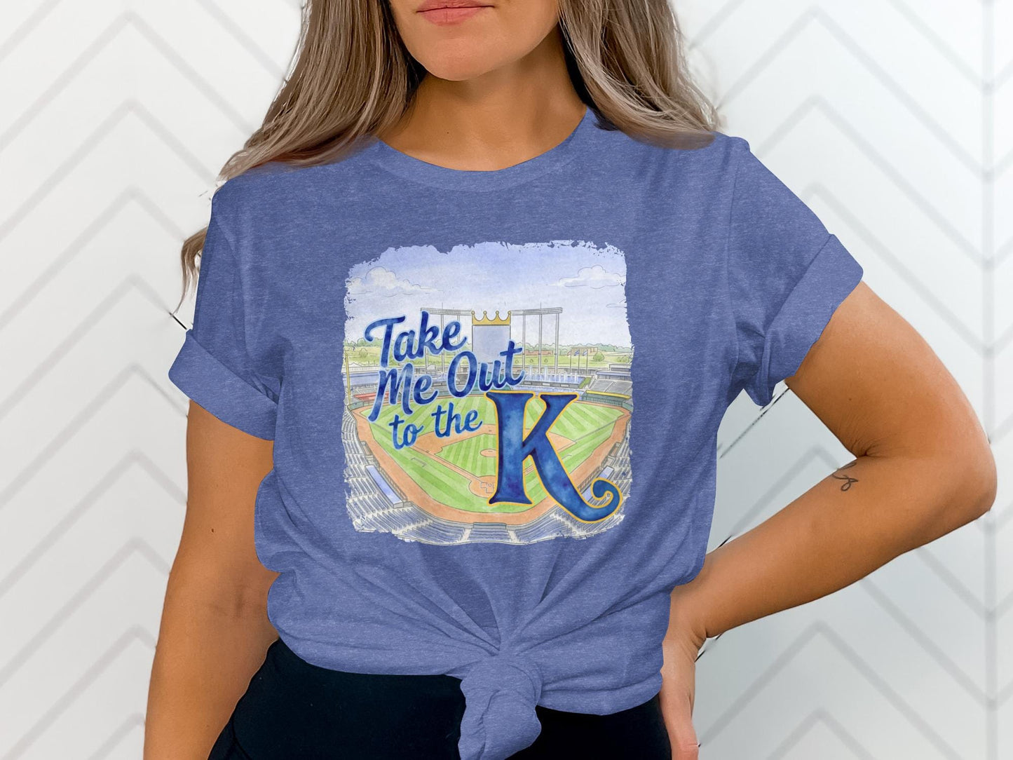 Blue t-shirt with watercolor Kansas City Royals stadium and "Take Me Out to the K" text.