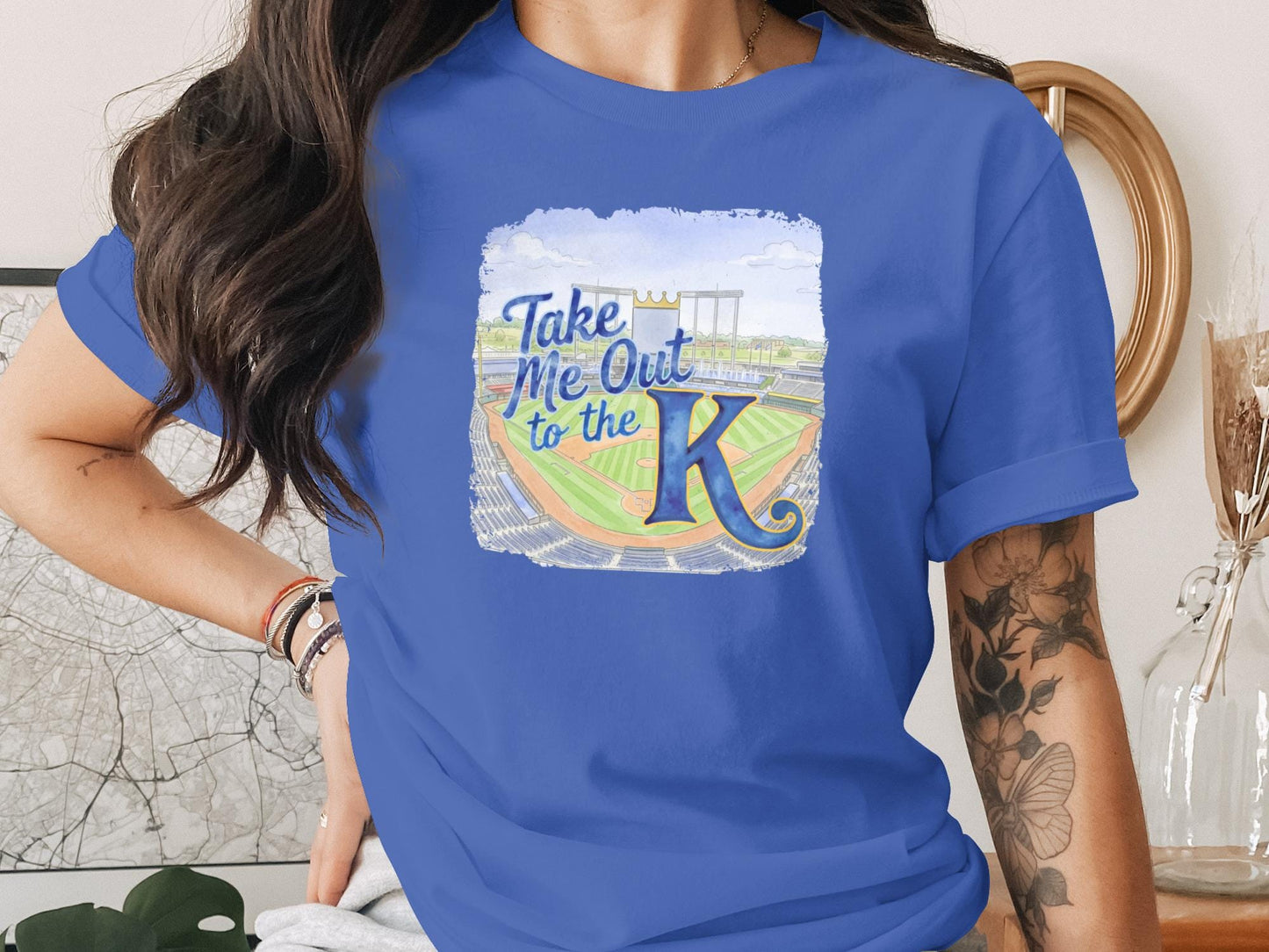 Blue t-shirt with watercolor stadium and "Take Me Out to the K" text.