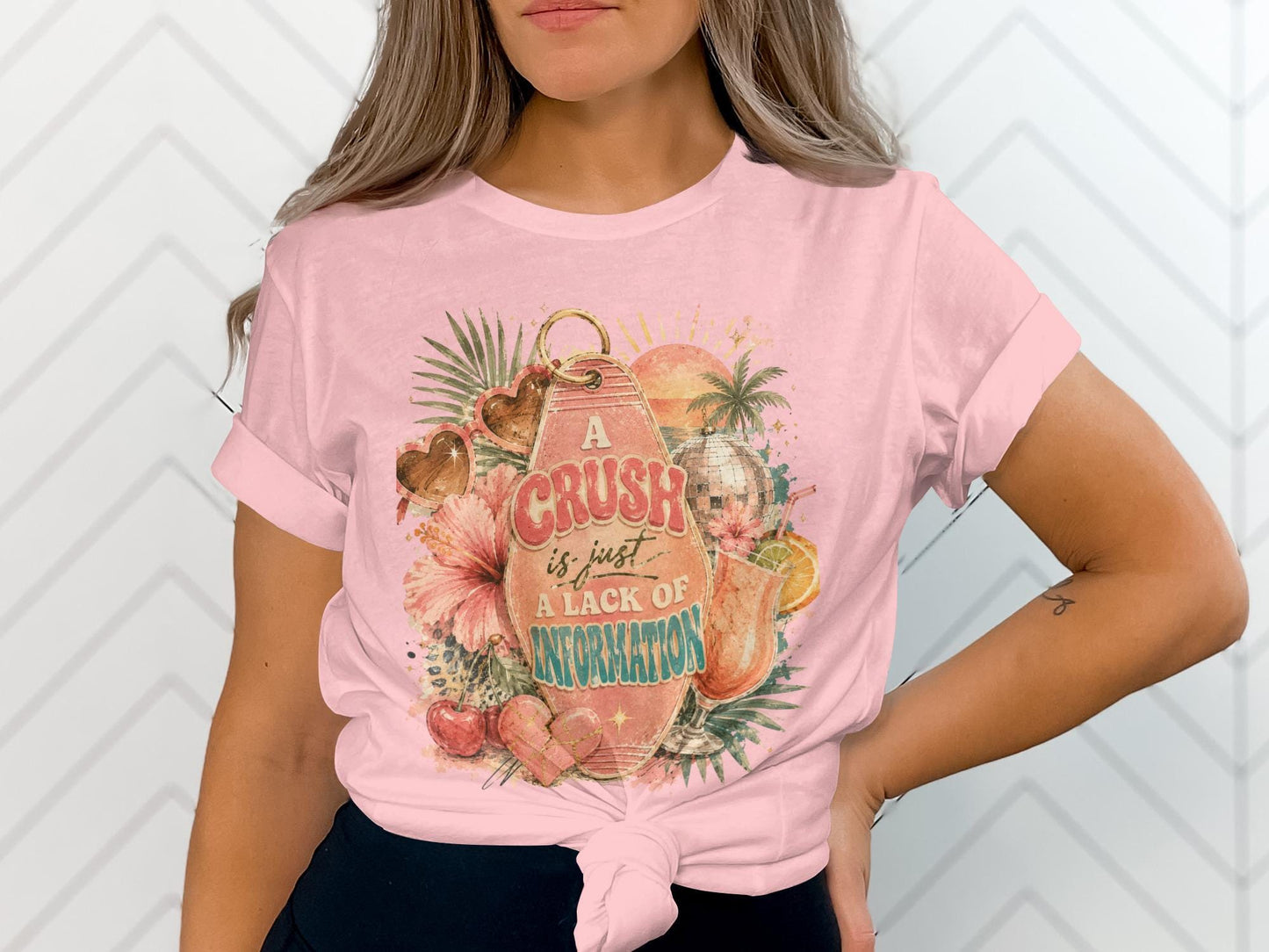 Pink t-shirt with retro graphic: "A Crush is just A Lack of Information".
