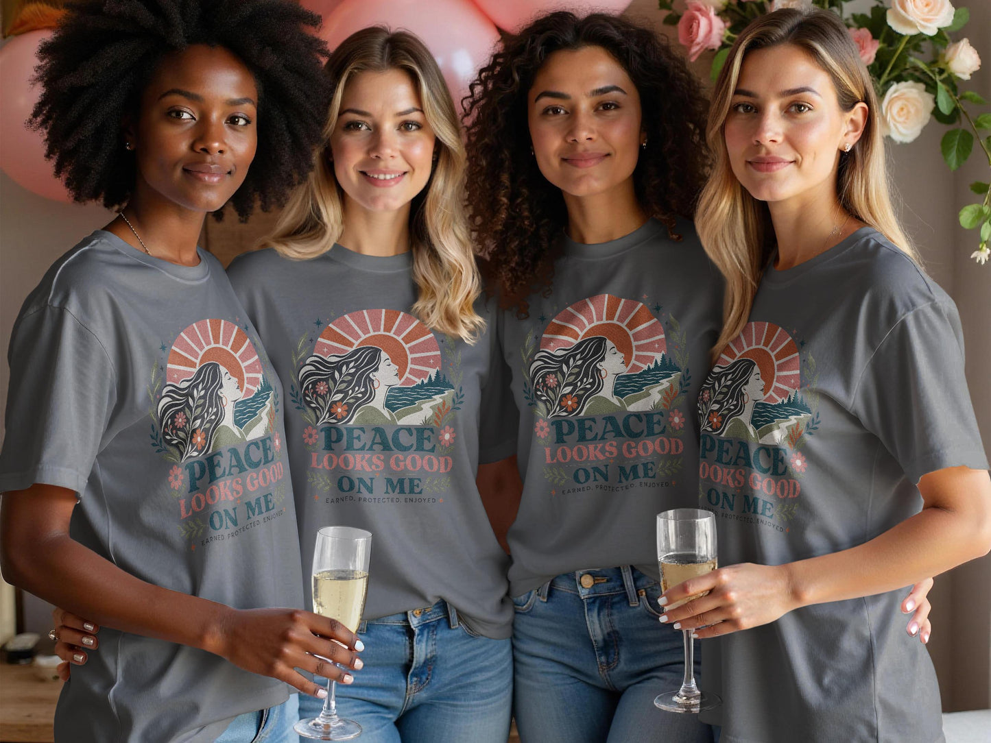 Four women in grey t-shirts with "Peace Looks Good On Me" graphic.
