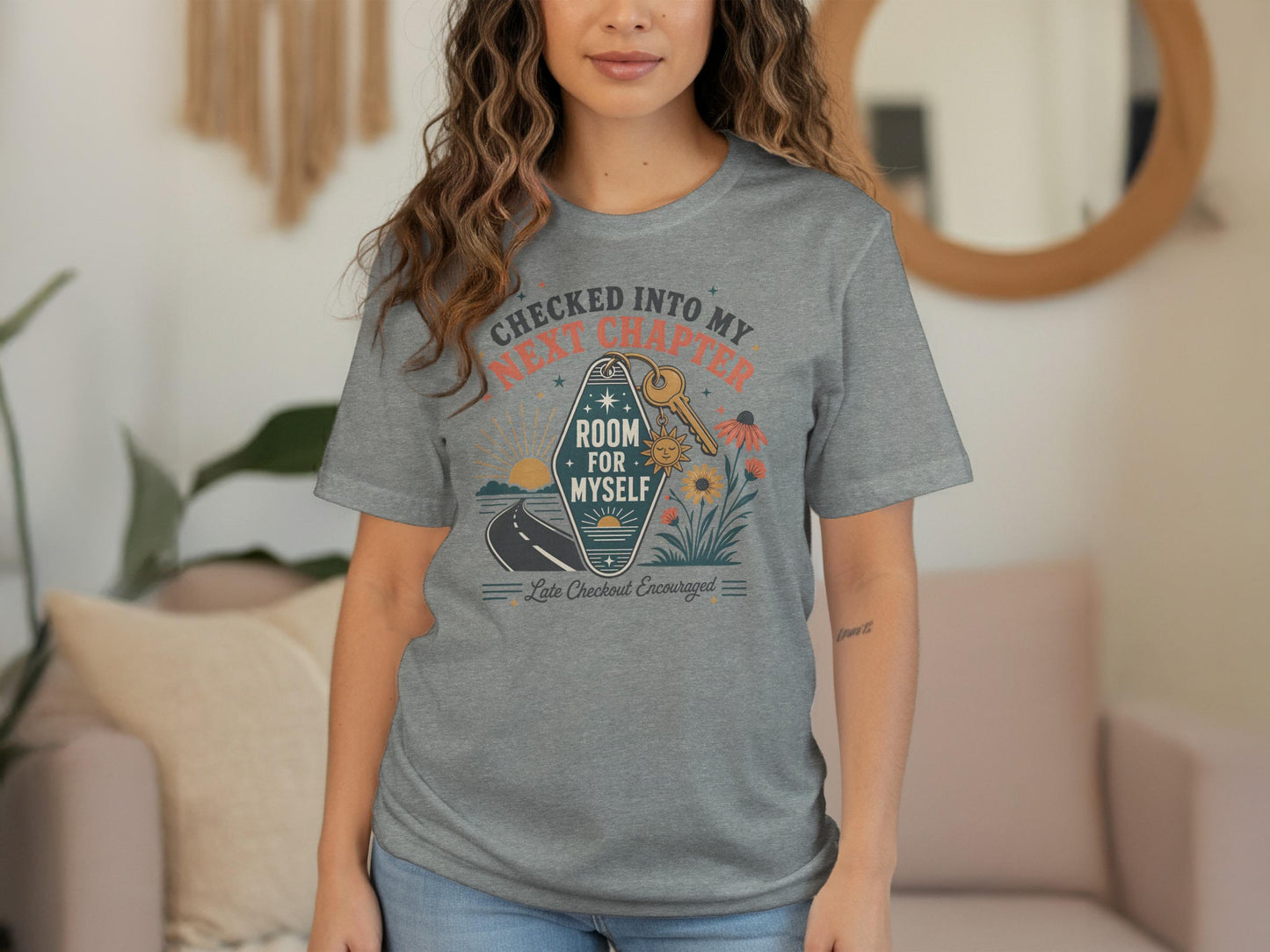 Gray t-shirt with graphic text "Checked Into My Next Chapter Room For Myself".
