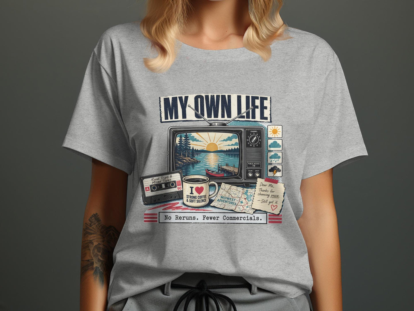 T-shirt graphic with "MY OWN LIFE" text, vintage TV, cassette tape, coffee mug, and map.