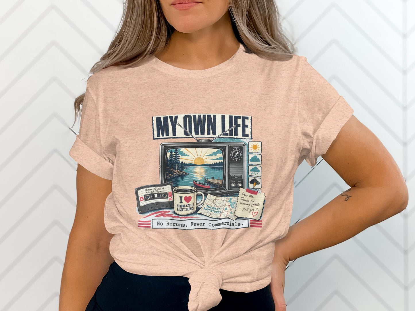 T-shirt graphic with retro TV, cassette, and note stating "My Own Life."