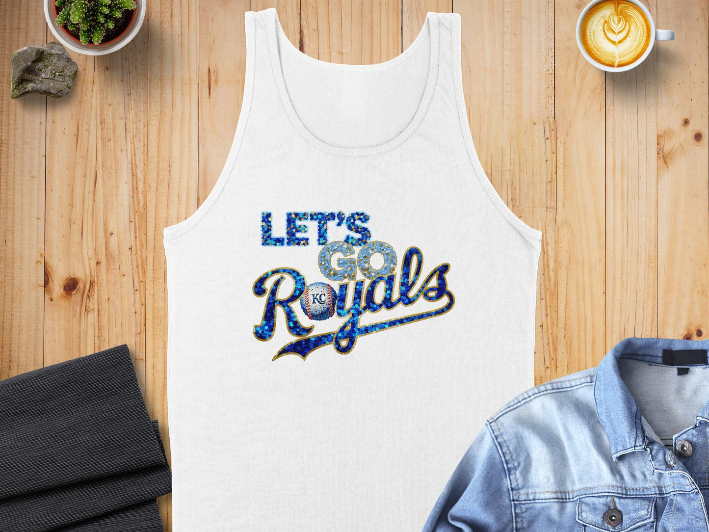 White tank top with "LET'S GO Royals" text in blue glitter and gold trim.