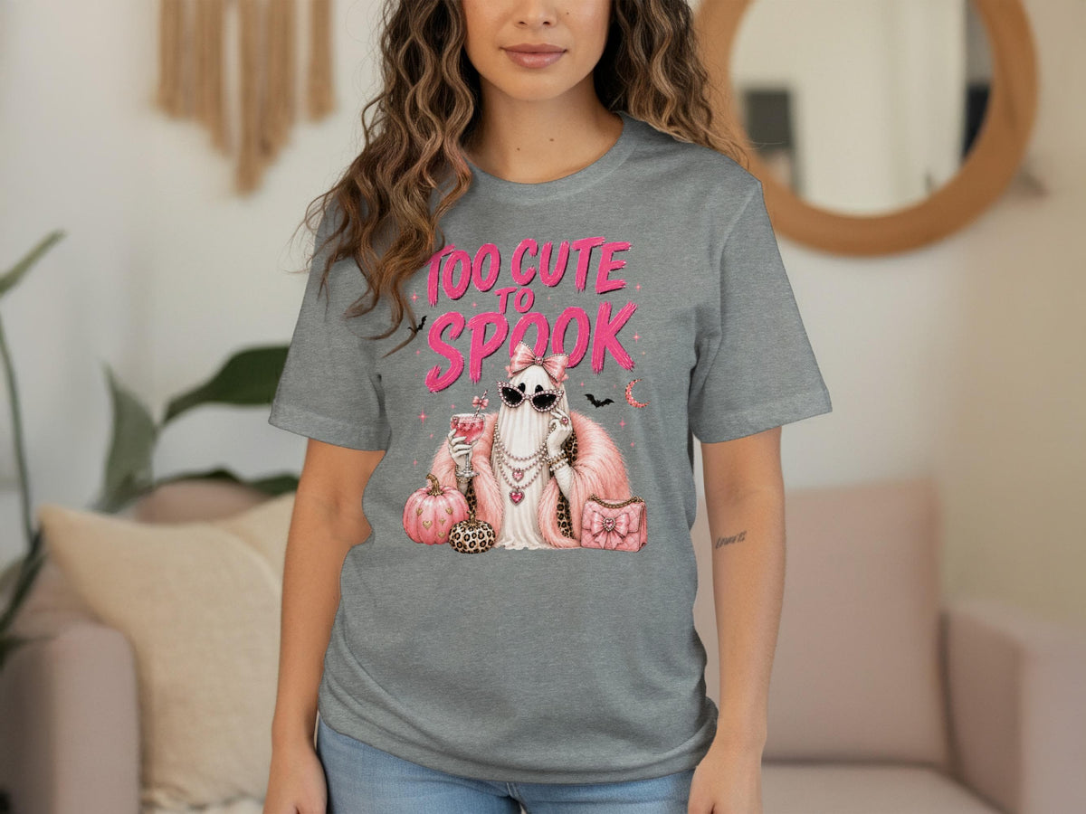Gray t-shirt with a ghost graphic that reads "Too Cute to Spook" and Halloween imagery.